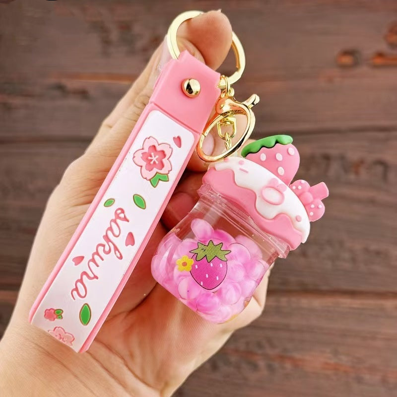 Erdbeer-Sakura-Blasen-Flüssigkeits-Schlüsselanhänger