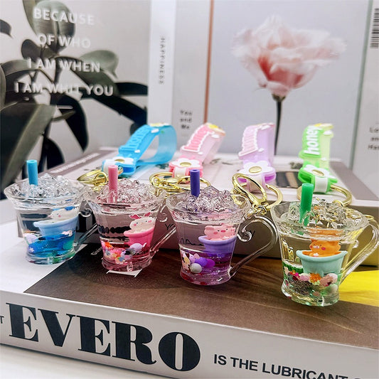 Kawaii nyckelring med svävande engelsk tekopp